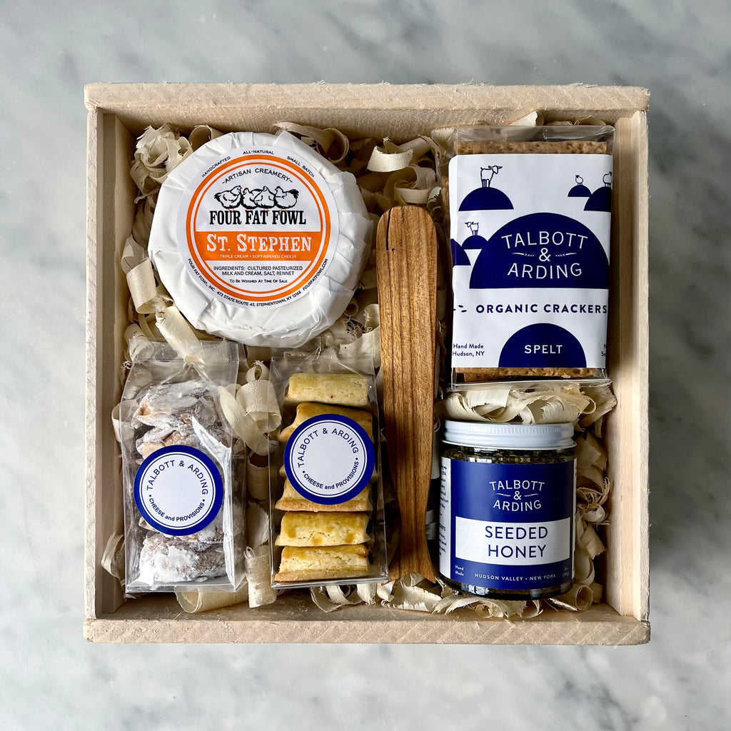 A gourmet cheese and food gift box.