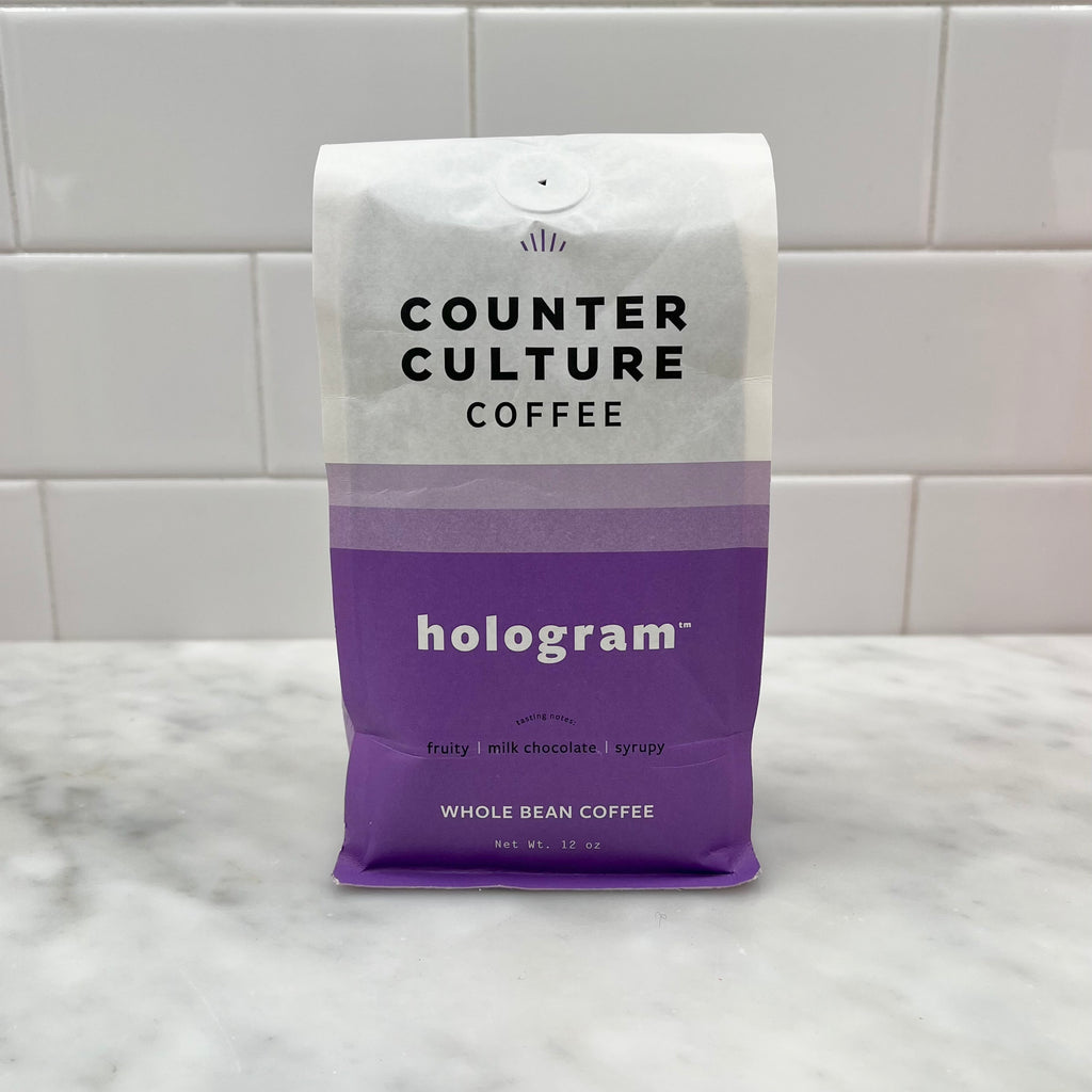 Bag of Counter Culture Coffee whole beans on a counter.