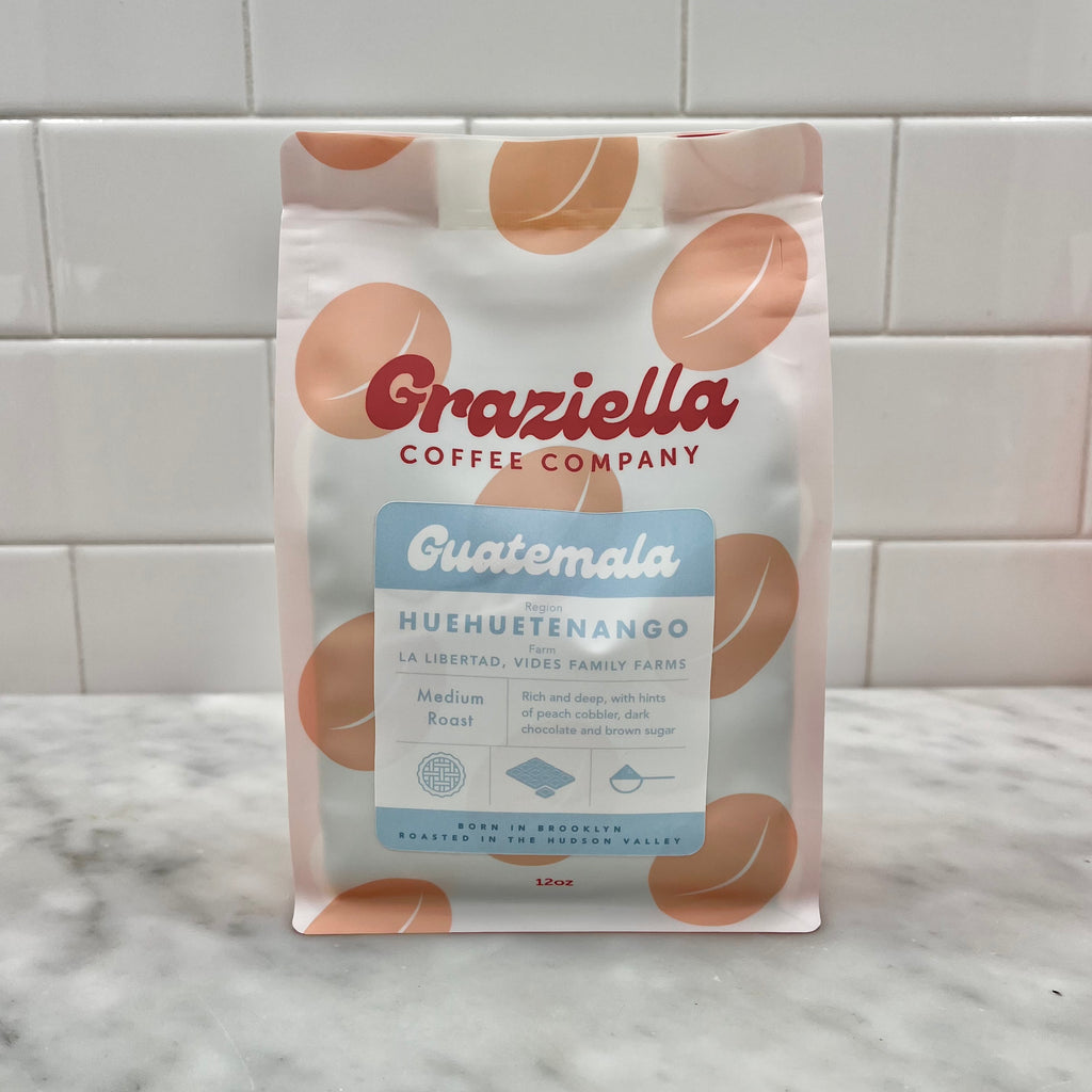 A bag of Graziella Coffee Company Guatemala medium roast on a kitchen counter.