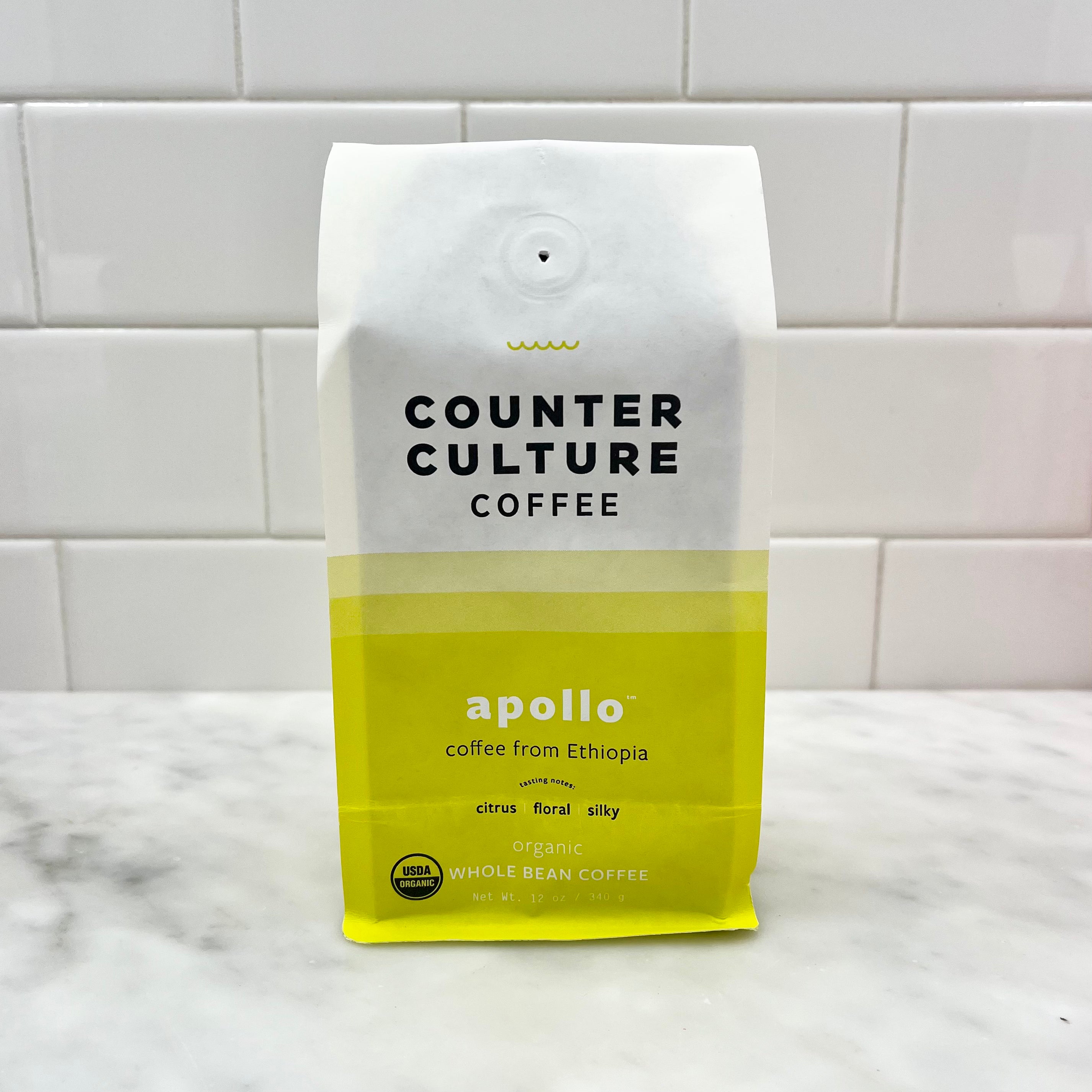 A bag of Counter Culture Coffee on a marble countertop.