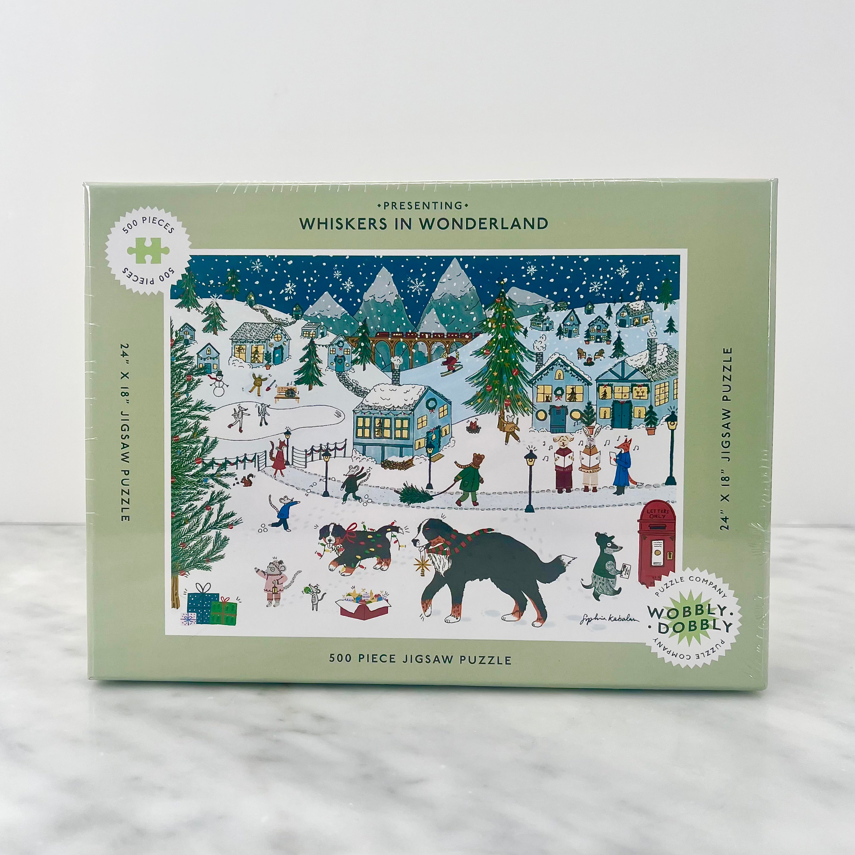 Jigsaw puzzle box with a winter holiday theme.