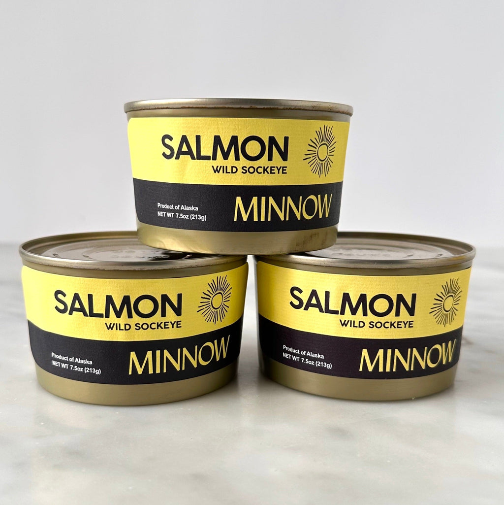 stacked tins of Minnow Wild Sockeye Salmon